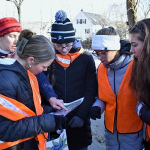 Students consult their trash pickup route map. FRITZ FREUDENBERGER/Boothbay Register 