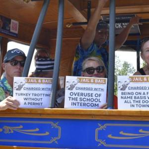 The trolley got a prison-themed makeover July 16 as locals hopped aboard to raise "bail money" for continued maintenance of the historic vehicle. From left, Allan Osborn, Tricia Campbell and Linda Osborn. ISABELLE CURTIS/Boothbay Register