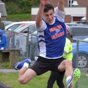 Ben Zapski competing in the long jump. BILL PEARSON/Boothbay Register