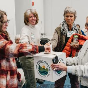 100+ Women Who Care Lincoln County members vote at the January meeting. Melissa Keyser photo