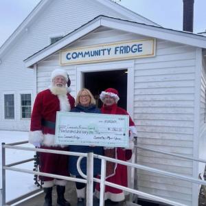 Mr. and Mrs. Claus with Holly Stover at Community Fridge. Courtesy photo