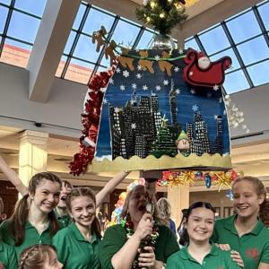 Lucie Hollon, Sloan Nelson, Jessie Ullo, Kyleigh Cole, Lina Minzner and Isla Sullivan pose with Brianne Martin and her spirit stick!  Emily Mirabile photo