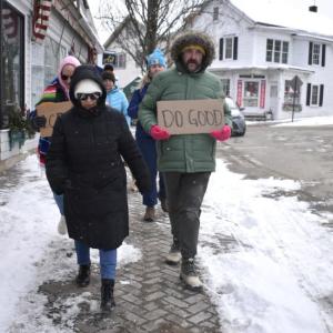 Protestors walk down Townsend Avenue. ISABELLE CURTIS/Boothbay Register