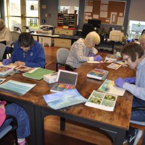 Lincoln Home residents meet monthly to create pastel paintings with Kim Traina.
