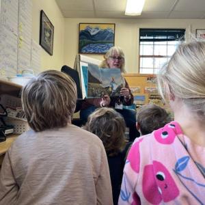 Deb Johnson of the Maine Mineral and Gem Museum in Bethel speaks to CTL students about fossils as part of all-school geology and paleontology study. Courtesy of CTL