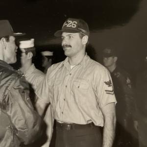 Andy Benedict listening to a higher up in the Navy. Courtesy photo