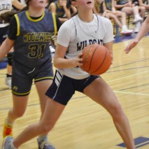Madilyn Alley drives the baseline in the second quarter of Friday's contest. KEVIN BURNHAM/Boothbay Register