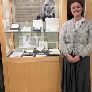 Campbell with the “Chamberlain: The Man Behind the Moustache" exhibition. Courtesy of Grace Campbell.