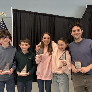 CTL students Charlie Record, Toby McKenzie, Enilea Burns, and Adeline Inman with coach Nick Record following their 2nd place showing at the MathCounts regional contest. Courtesy of CTL