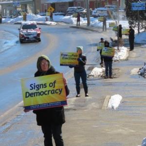 New signs by Lincoln County Indivisible on display this past weekend. Courtesy photo