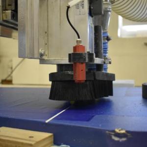 The CNC router at work. ISABELLE CURTIS/Boothbay Register