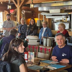 Waiting for food at the Feb. 16 Community Lunch. Courtesy photo