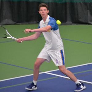 Harry Hinckley, playing first doubles, looks to return the ball. KEVIN BURNHAM/Boothbay Register