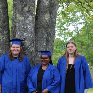 Nevaeh Morin, left, Camla Dunbar, and Allyson Warren celebrated their graduation from Boothbay-Wiscasset Regional Adult Education at Barrett Park on June 6. Anina Halter, not pictured, also graduated. Courtesy photo