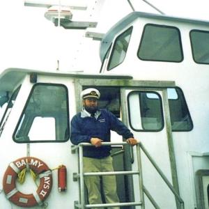 Capt. Mark Colby welcoming passengers aboard the Balmy Days II. Courtesy image