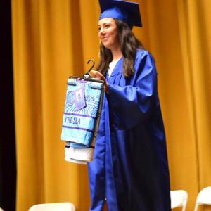 Sophie White delivers a gift. KEVIN BURNHAM/Boothbay Register