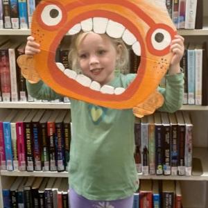 Each participant got a passport photo taken to put in their booklet. ISABELLE CURTIS/Boothbay Register