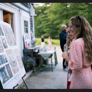 Guests peruse campus designs created by Knickerbocker Group and Carson Douglas Landscape Design. Courtesy of Shannon Parker