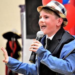 Spencer Pottle performing in Boothbay’s Got Talent where he won King of the Harbor. File photo
