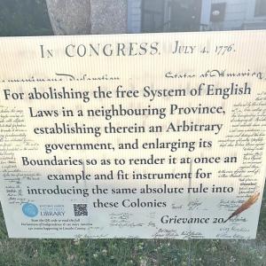 This is one of the many signs being posted at area businesses and organizations for the library’s Grievance Walking Tour. Each banner includes a QR code connecting visitors to additional resources encouraging participants to explore the Declaration while discovering the community. Staff photo