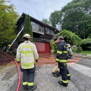 Firefighters at the scene of the fire at 7 Farnham Point Road, East Boothbay, June 30. Mark Sullivan photo