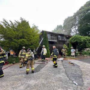 Firefighters at the scene of the fire at 7 Farnham Point Road, East Boothbay, June 30. Mark Sullivan photo