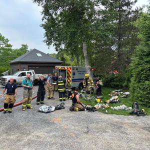 Firefighters at the scene of the fire at 7 Farnham Point Road, East Boothbay, June 30. Mark Sullivan photo