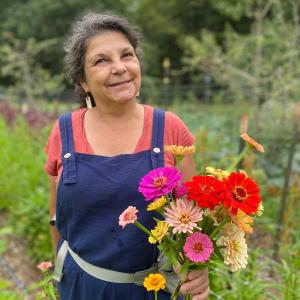  Designer Diane Farmer harvesting Veggies to Table flowers. Courtesy photo