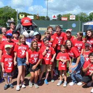 Mirabile's Y Arts group after their performance at Hadlock Field in Portland before a Sea Dogs game in 2022. File photo