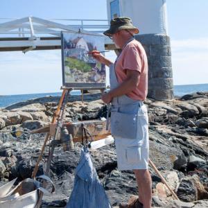 Neal Hughes paints at a favorite location, Marshall Point Lighthouse. Hughes and plein air colleague Crista Pisano will be at Sylvan Gallery during the WAW. Courtesy of Ann Scanlon 