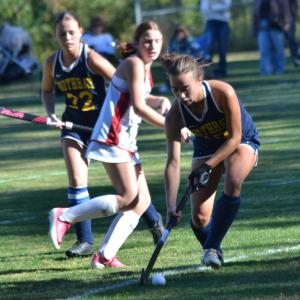 Moriah Smith enters the ball into the scoring D during the first half of Boothbay's home against Lisbon Sept. 23. KEVIN BURNHAM/Boothbay Register