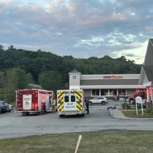 Firefighters and ambulance attendants at the scene of Friday's propane leak at the Meadow Mall. Mark Sullivan photo