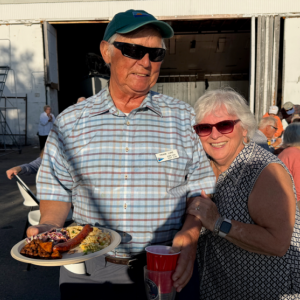 A little Boothbay history at the DEYC Haul Out Party: longtime DEYC members Brenda Blake and Frank Luke, friends and Boothbay Region High School class of 1963, share a moment at Luke’s Boatyard on Linekin Bay. Courtesy of Jeanne Koenig