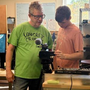 Sheppard and Hyson adjust the camera's white balance in preparation. ISABELLE CURTIS/Boothbay Register
