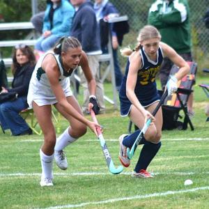 Seahawk sophomore Sophia Gatnar and Winthrop senior Gabby Janik look to gain control of the ball. KEVIN BURNHAM/Boothbay Register
