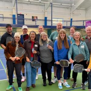Participants in the Y’s Business Partners thank-you event with seasonal Southport residents and Dogfish Head brewery co-founders Mariah and Sam Calagione. Courtesy of BRYMCA