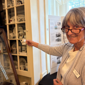 Kay Wilder holds the Austrian porcelain pitcher with a transfer print of the hotel exterior and hand painted gold trim. Courtesy photo