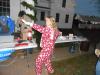 A super-caffeinated Sarah Morley pretends to surf at Boothbay Harbor Memorial Library during Early Bird.
