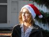 A stranger from away wearing a Santa hat. 