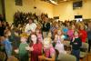 Elementary and high school students and staff give Ellie Logan a standing ovation. KEVIN BURNHAM/Boothbay Register