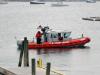 The Coast Guard heads back to the station after escorting Santa to the town dock. GARY DOW/Boothbay Register