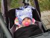 Kayla Watts of Southport, 8 months, keeps warm while waiting for Santa Claus. GARY DOW/Boothbay Register