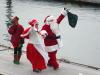 HO, HO, HO! Santa and Mrs. Claus waive to the awaiting crowd in the Waterfront Park. GARY DOW/Boothbay Register
