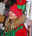 An adult elf (Romee May) takes a break from serving hot chocolate at the Memorial Library. GARY DOW/Boothbay Register