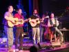 The Makem and Spain Brothers entertain the crowd at the Opera House at Boothbay Harbor December 8. The brothers blended Christmas songs with their traditional Irish folk style. RYAN LEIGHTON/Boothbay Register