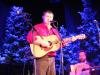 Rory Makem serenades the audience with a Christmas song he wrote. Mickey Spain is pictured in the background. RYAN LEIGHTON/Boothbay Register