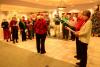 Stephanie Klecharczyk leads a group of carolers at St Andrews Village on December 18. Courtesy of Steve Demeranville 