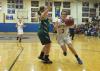 Ashley Reed tries to drive past a Winthrop defender. RYAN LEIGHTON/Boothbay Register