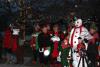 Frosty the Snowman, a Christmas Moose and Santa's Elves brightened up the day and the singing for Harbor Lights goers. SUE MELLO/Boothbay Register