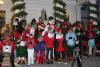 Rebecca Roberts joyfully directed the Community Band and chorus in a selection of Christmas carols at the annual Harbor LIghts holiday ritual at the Boothbay Harbor Memorial Library. SUE MELLO/Boothbay Register